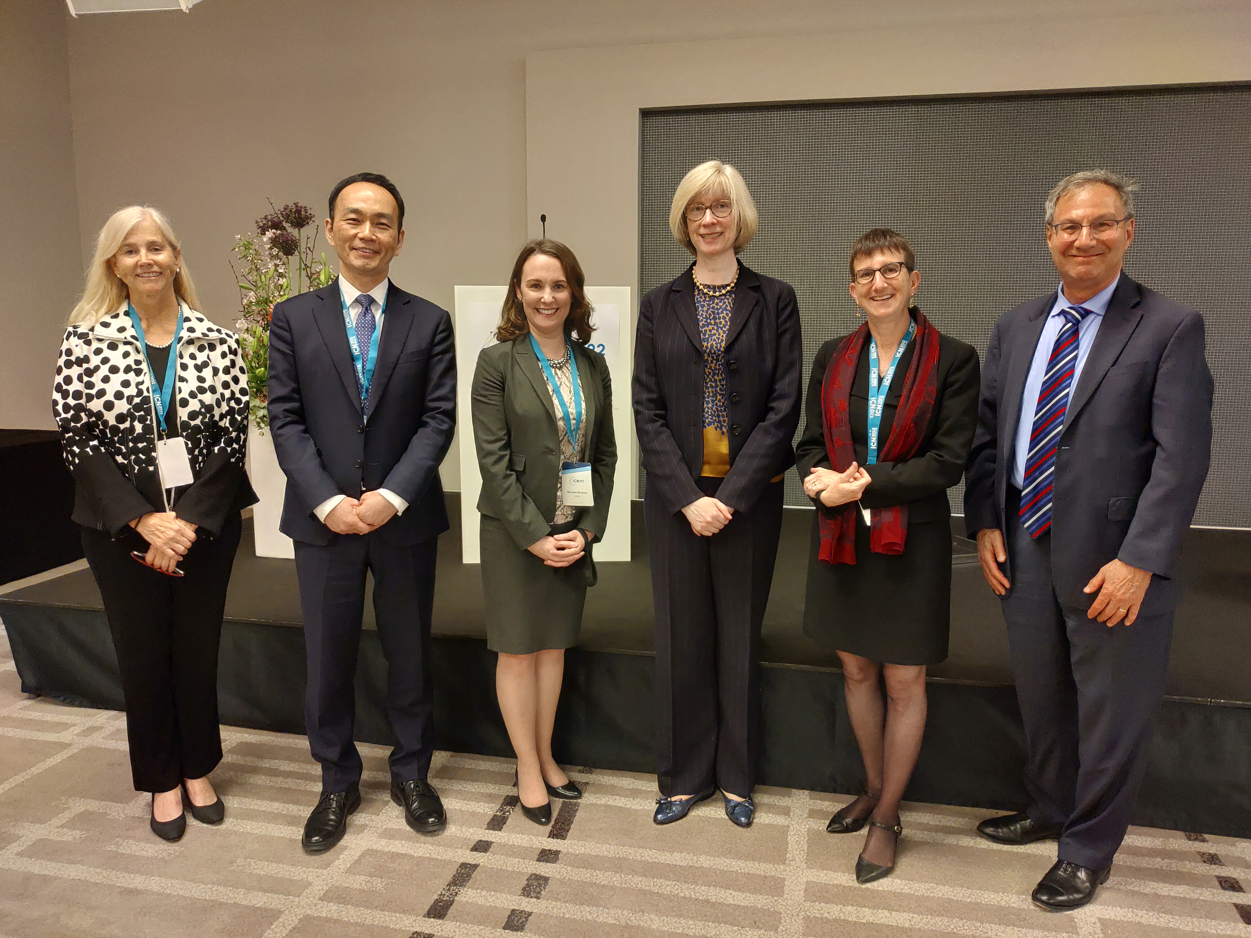 A photo of Vice Chairperson（Dr. Andy CHEN）posing with the officials from USFTC and USDOJ during the 2022 ICN Annual Conference at Berlin, Germany.